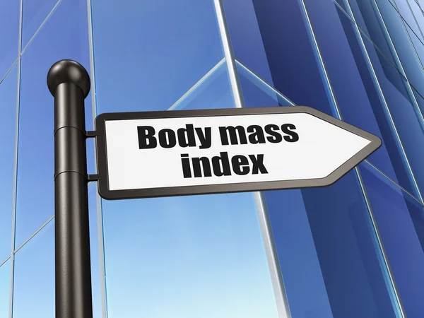 Концепция здравоохранения: подпись Индекс массы тела на фоне строительства — стоковое фото