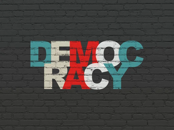 Politická koncepce: demokracie na zeď na pozadí — Stock fotografie