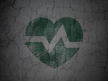 Healthcare concept: Heart on grunge wall background