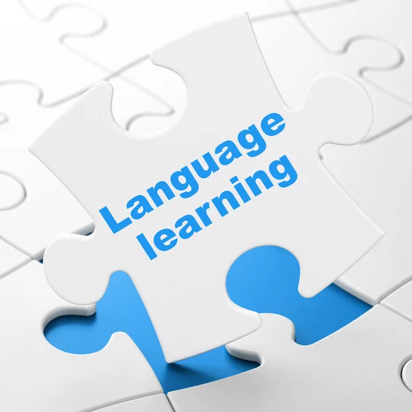 Education concept: Language Learning on puzzle background — Stock Photo, Image