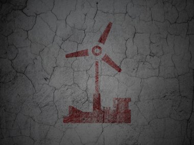 Manufacuring concept: Windmill on grunge wall background