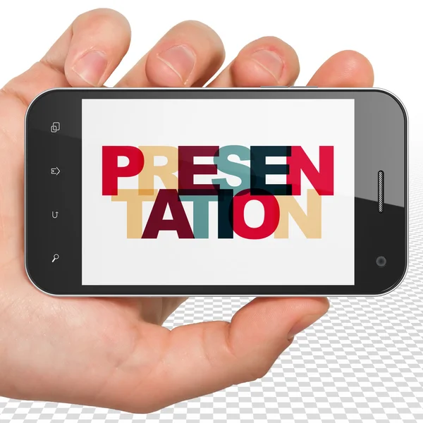 Reklamní koncept: ruční přidržující telefon Smartphone s prezentací na displeji — Stock fotografie