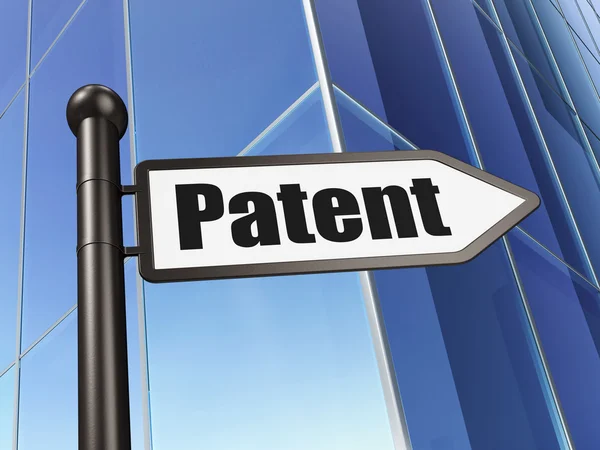 Concepto de derecho: firmar la patente sobre la construcción de antecedentes —  Fotos de Stock