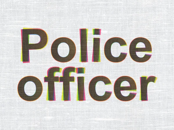 法律の概念:ファブリックテクスチャの背景に警察官 — ストック写真