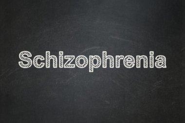Healthcare concept: Schizophrenia on chalkboard background