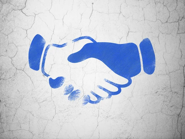 Business concept: Handshake on wall background — Stock Photo, Image