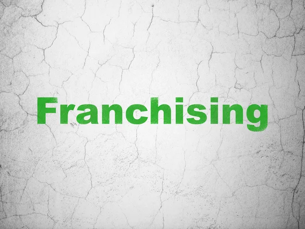 Geschäftskonzept: Franchising auf Wandhintergrund — Stockfoto