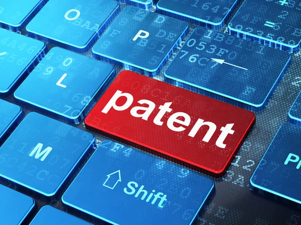 Concepto de ley: Patente en el fondo del teclado del ordenador —  Fotos de Stock