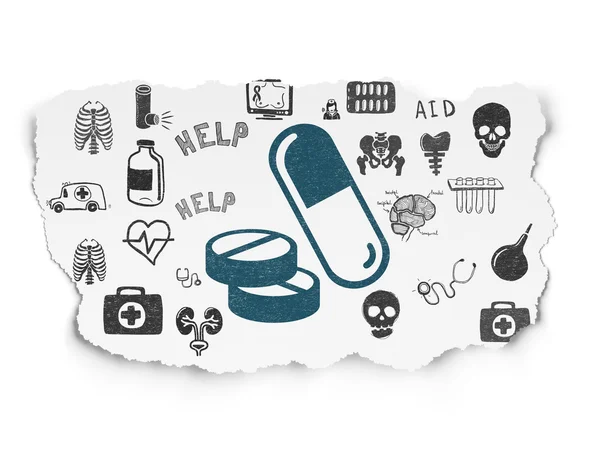 Medicine concept: Pills on Torn Paper background — 图库照片