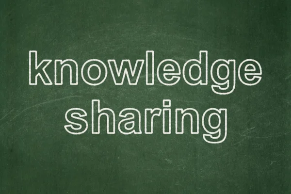 Education concept: Knowledge Sharing on chalkboard background — Stock Photo, Image