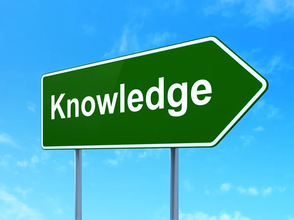 Learning concept: Knowledge on road sign background — Stock Photo, Image