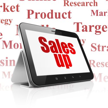 Advertising concept: Tablet Computer with Sales Up on display