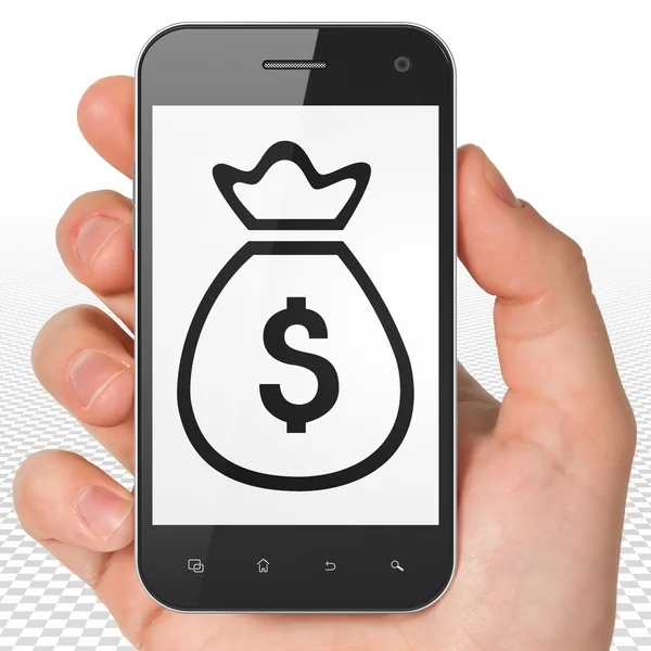 Conceito bancário: mão segurando Smartphone com saco de dinheiro em exposição — Fotografia de Stock