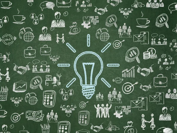 Finance concept: Light Bulb on School board background — Stock Photo, Image