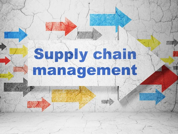 Concetto pubblicitario: freccia con Supply Chain Management su sfondo grunge wall — Foto Stock