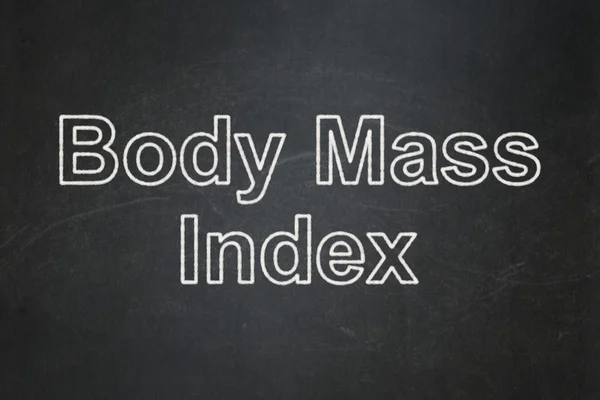 Концепция здравоохранения: Индекс массы тела на фоне доски — стоковое фото