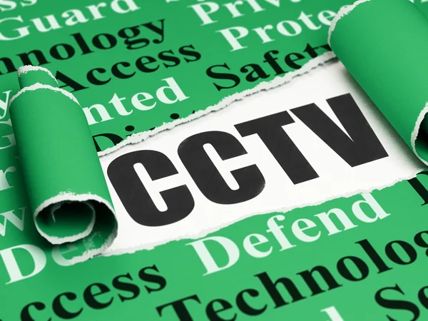 Safety concept: black text CCTV under the piece of  torn paper — Stock Photo, Image