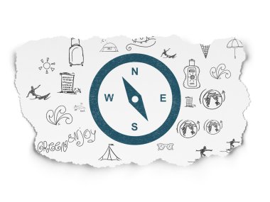 Tourism concept: Compass on Torn Paper background