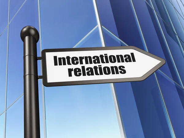 Politics concept: sign International Relations on Building background — Stock Photo, Image