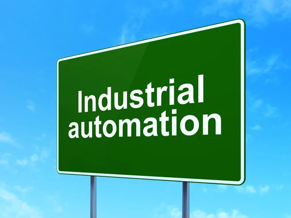 Концепция отрасли: Промышленная автоматизация на фоне дорожных знаков — стоковое фото