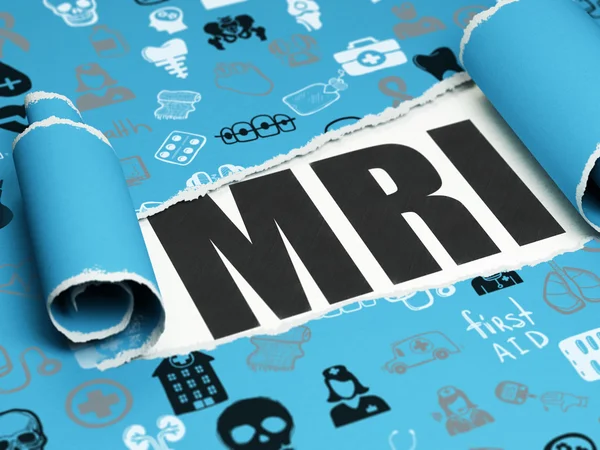 Conceito de saúde: texto preto MRI sob o pedaço de papel rasgado — Fotografia de Stock