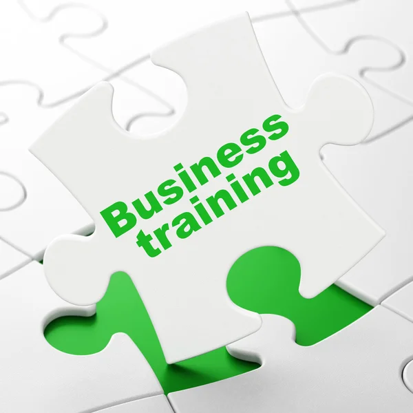 Onderwijsconcept: Business Training over puzzel achtergrond — Stockfoto