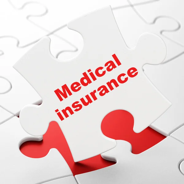 保険の概念: パズルの背景に医療保険 — ストック写真