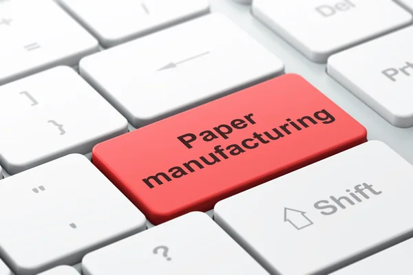 Концепція виробництва: Виробництво паперу на фоні клавіатури комп'ютера — стокове фото