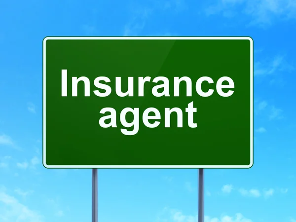 Insurance concept: Insurance Agent on road sign background — Stok fotoğraf