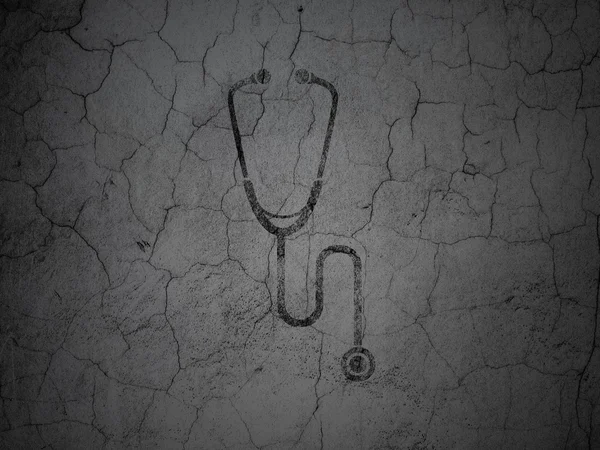 Концепция здоровья: Стетоскоп на фоне гранжевых стен — стоковое фото