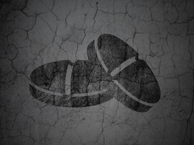 Health concept: Pills on grunge wall background