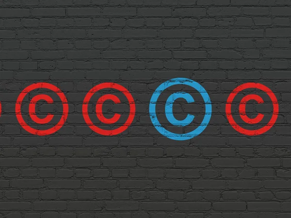 Law concept: copyright icon on wall background — Stock Photo, Image