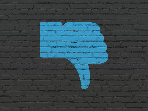 Social network concept: Thumb Down on wall background — Stock Photo, Image