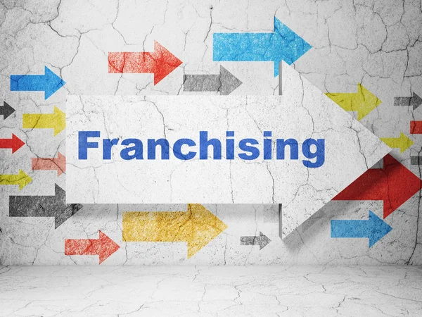 Business concept: freccia con Franchising su sfondo grunge wall — Foto Stock