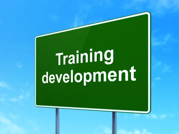 Studying concept: Training Development on road sign background — Stock Photo, Image