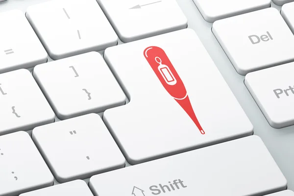 Medizinkonzept: Thermometer auf Computertastatur-Hintergrund — Stockfoto