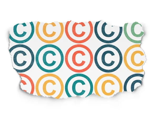 Concetto di legge: icone di copyright su sfondo carta strappata — Foto Stock