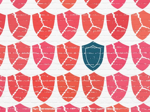 Privacy concept: shield icon on wall background — Stock Photo, Image