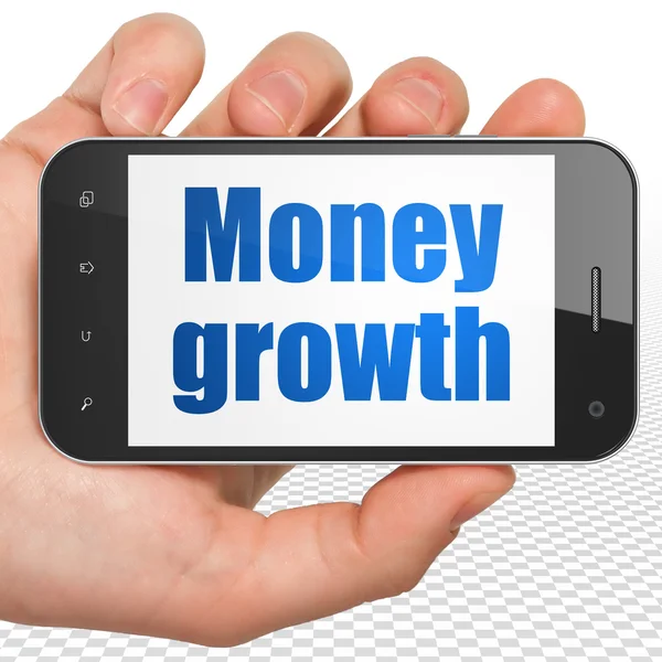 Pengar koncept: Hand hålla Smartphone med pengar tillväxt på displayen — Stockfoto