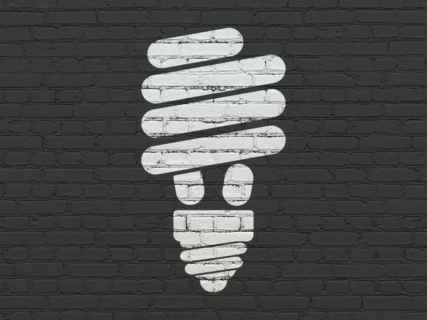 Financiën concept: energiebesparende lamp op muur achtergrond — Stockfoto