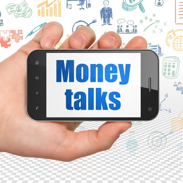 Finance concept: Hand Holding Smartphone with Money Talks — ストック写真