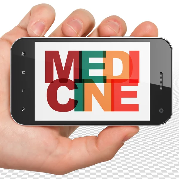 Концепция здоровья: Ручной смартфон с лекарством — стоковое фото