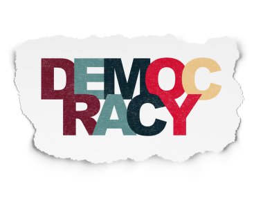 Political concept: Democracy on Torn Paper background