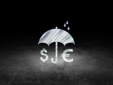 Insurance concept: Money And Umbrella in grunge dark room