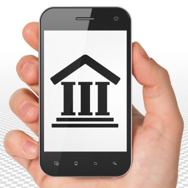 Law concept: Hand Holding Smartphone with Courthouse on display