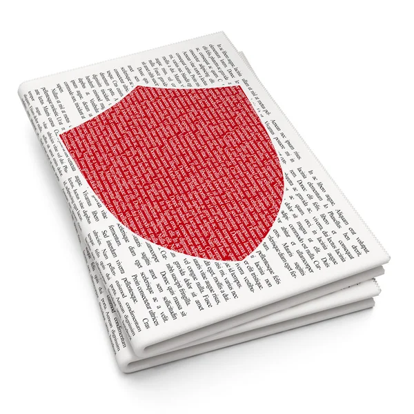 Protection concept: Shield on Newspaper background — 图库照片