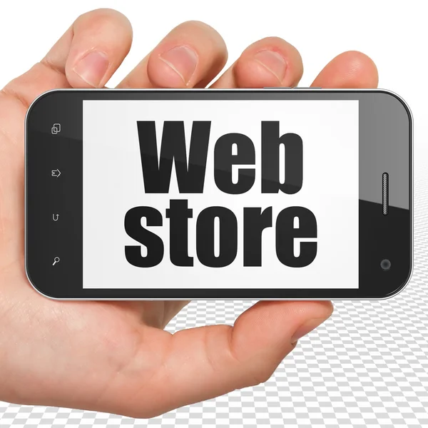 Concept de conception Web : Smartphone à main avec Web Store à l'écran — Photo