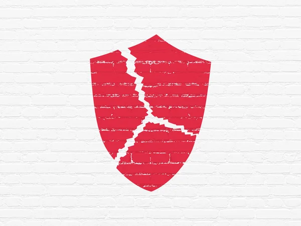 Protection concept: Broken Shield on wall background — Stock Photo, Image