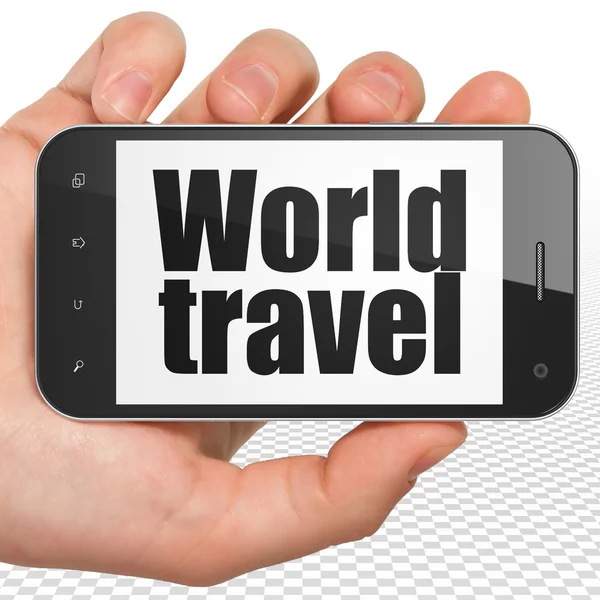 Tourism concept: Hand Holding Smartphone with World Travel on display — Stockfoto
