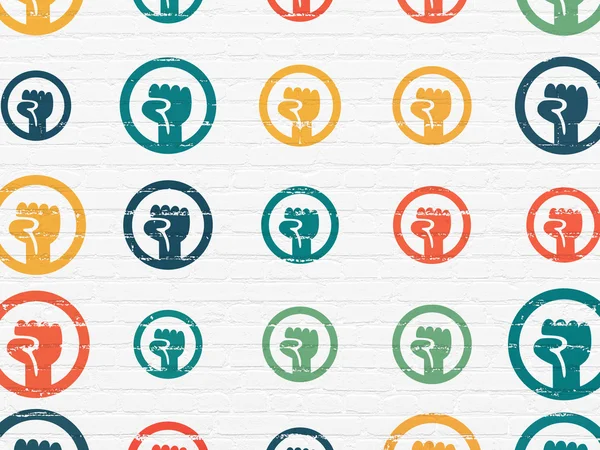 Politics concept: Uprising icons on wall background